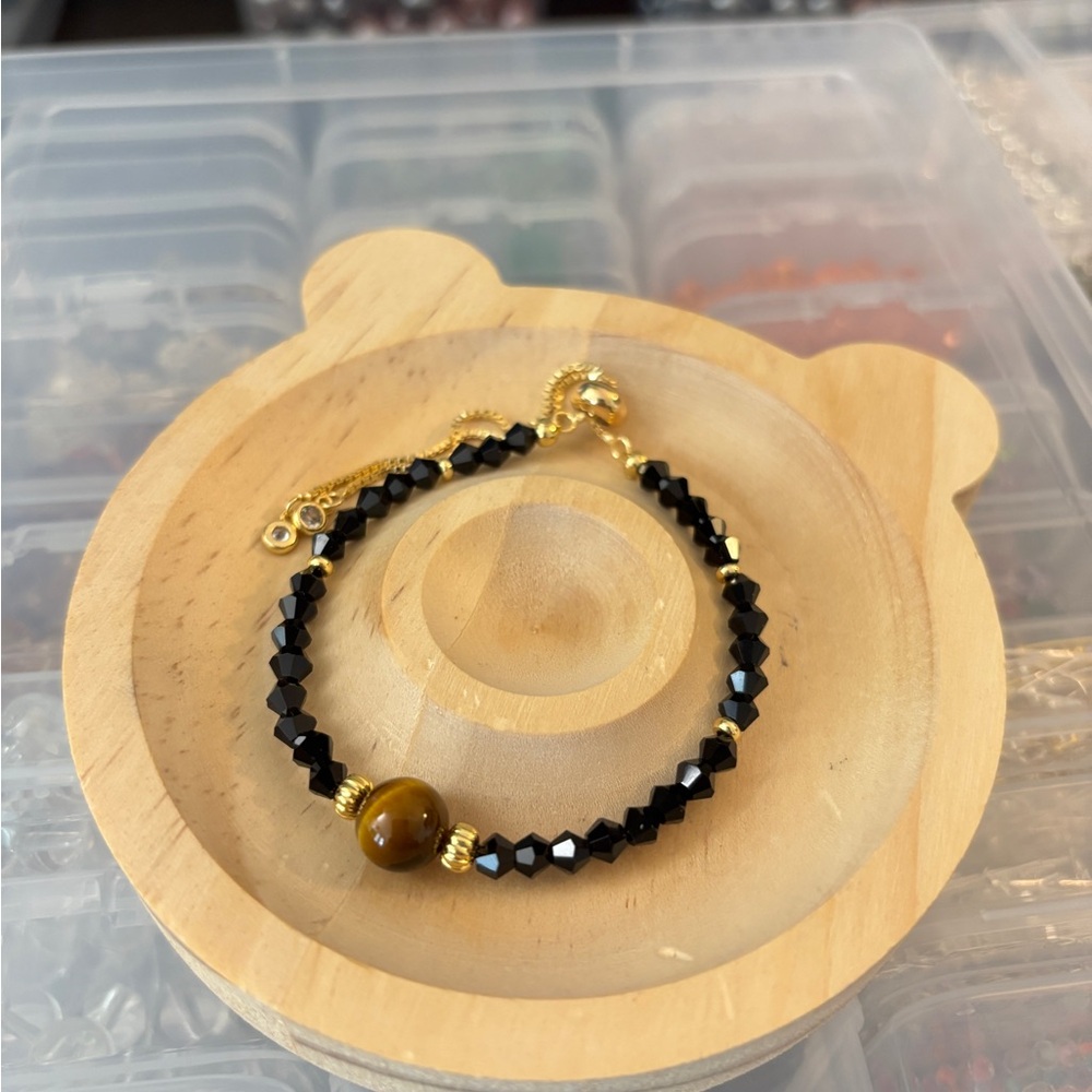 Handmade bracelet with crystals and tiger eye stone